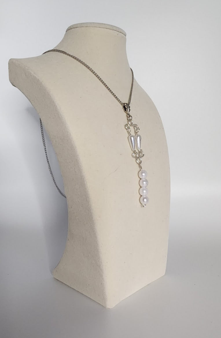 Elegance of Faux Pearls Meets Symmetry of Art Deco