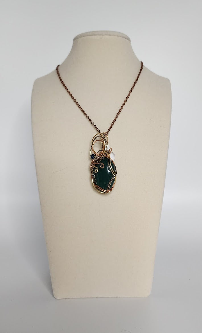 Elegant Tri-Metal and Dark Emerald Green Pendant