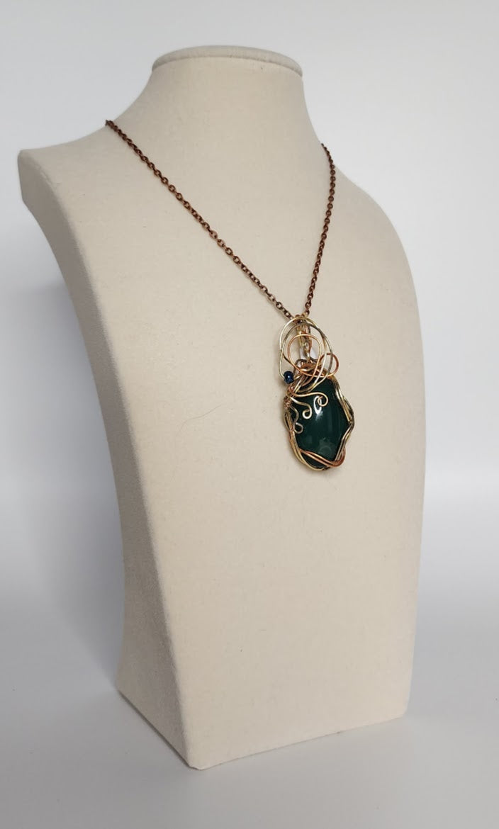 Elegant Tri-Metal and Dark Emerald Green Pendant