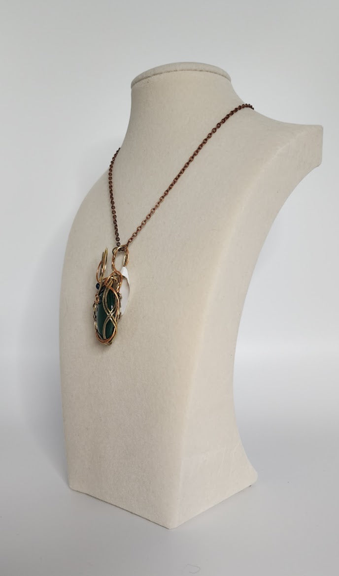 Elegant Tri-Metal and Dark Emerald Green Pendant
